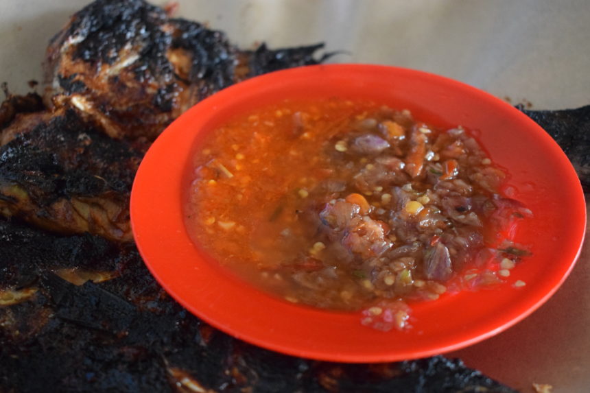 small plate of sambal terasi and sambal matah at Bakar Ikan Made Ripuk