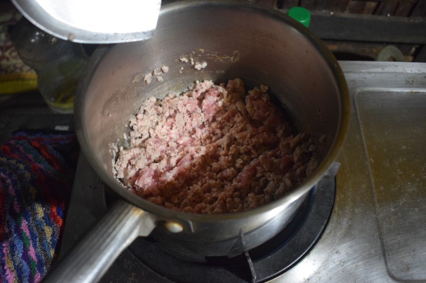 cooking the mince stage 2 - meat partially coloured and juices beginning to come out