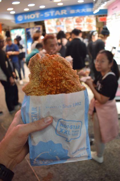 Hot Star Large Fried Chicken fillet held in hand