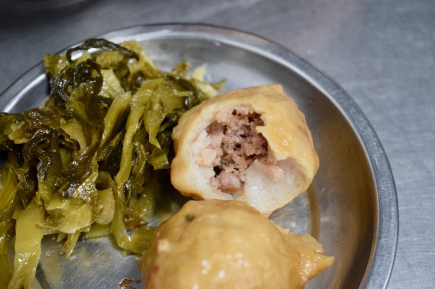 Meatball with two layers made of different types of pork