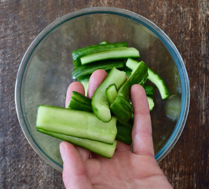 Cucumber batons after first stage of curing showing shrivelled appearance and bendy texture