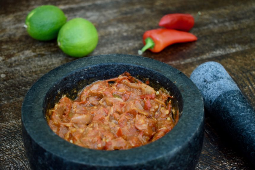 My terasi sambal with a rustic texture in a mortar (used instead of a cobek)