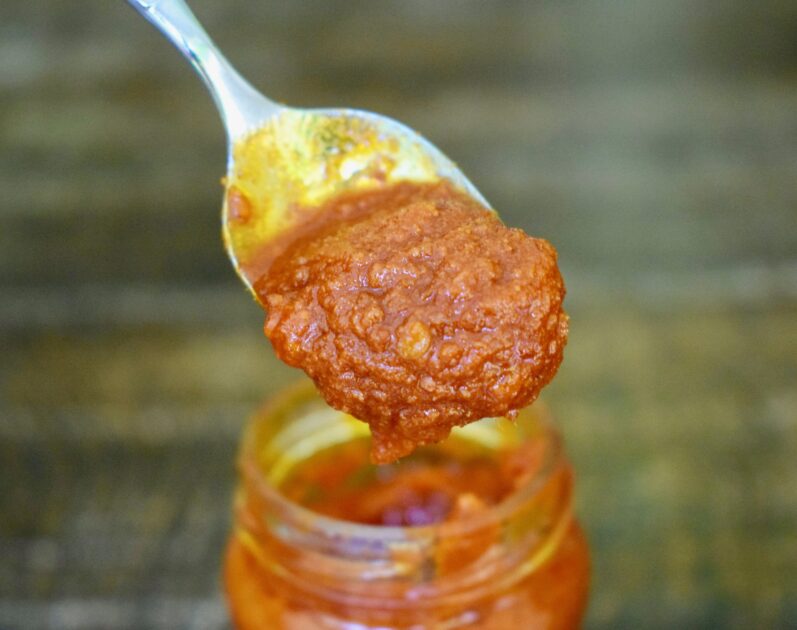 Red nduja paste from Tesco on a spoon