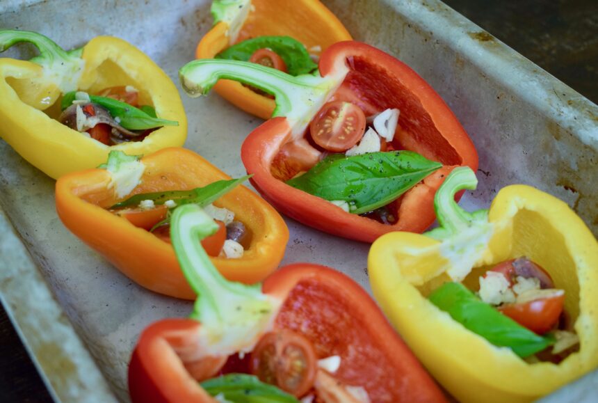 A close-up of a raw Italian roasted red pepper and garlic also showing anchovy, basil and chilli